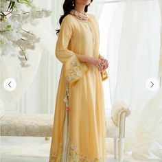 Like New 2 Piece Suit. Size Small Shirt Material: Raw Silk Dupatta: Organza Very Good Condition Only Worn Twice. Has 2 Small Stains On The Sleeves But Once Wearing You Cannot Notice Them At All. Please See Pics For More Details Elegant Summer Salwar Kameez With Straight Kurta, Elegant Yellow Salwar Kameez For Spring, Designer Spring Tunic Dress, Traditional Drape Dresses For Spring, Elegant Summer Kurta, Semi-stitched, Unstitched Tunic Dress With Dupatta, Elegant Summer Kurta With Sheer Dupatta, Spring Anarkali Dress With Dabka Embroidery, Semi-stitched Long Sleeve Dresses For Summer