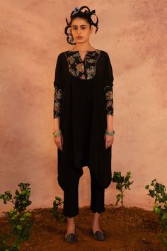 Black kaftan hand painted with kalamkari and highlighted with mirror, zardosi, pitta and cutwork embroidery. Paired with a solid pant. - Aza Fashions Designer Wear Salwar Kameez With Dabka In Tunic Shape, Anarkali Style Kurta With Mirror Work, Embroidered Anarkali Tunic Palazzo Set, Anarkali Embroidered Palazzo Set With Tunic, Designer Wear Mirror Work Kurta Tunic, Designer Kaftan With Mirror Work For Navratri, Designer Salwar Kameez For Navratri, Traditional Designer Tunic With Mirror Work, Designer Tunic Salwar Kameez With Dabka Detailing