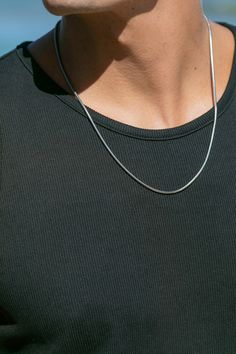 A staple, stainless steel snake chain. Part of our new Men's Collection, but designed to be gender inclusive, it's sure to become as valuable as your favorite white tee.James is wearing the 24" inch length chain.✦ DETAILS ✦✧ Name: Likeke (lee-KEH-keh) - courageous ruler.✧ Thickness: 3mm.✧ Stainless Steel.✧ All Ke Aloha Jewelry pieces come packaged thoughtfully, beautifully, and ready for gift giving.✧ Unless otherwise noted in the listing description, all pieces are sold individually. Photos wit Silver Snake Chain Necklace For Everyday, Everyday Silver Snake Chain Necklace, Silver Chain For Men Mens Fashion, White Gold Chain For Men, Silver Chain Design For Men, Men With Chains, Chain Men Necklace, Guy Jewelry, Mens Chains