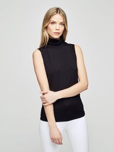 A sleeveless black turtleneck with timeless appeal gets a subtle sheen and smooth finish from a luxe microfiber fabrication. The slim fit compliments denim and is an ideal for base layer Band Collar Blouse, Fairhope Al, Designer House, Designer Boutique, Sleeveless Turtleneck, J Mclaughlin, Daytime Dresses, Cowl Neck Top, Layer Style