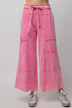 These may be the best lounge pants we've ever seen. Mineral washed Terry knit pants featuring cargo style pockets, wide legs, elastic ached waist and adjustable drawstring. Features exposed seaming. Relaxed and loose fit. Washed pink in color Model is 5'10 wearing a size small -Small measurements : length - 37' & waist -14' 100% Cotton Teacher Pants, Knit Wide Leg Pants, French Terry Pants, Cotton Cargo Pants, Style Pant, Warm Pants, Solid Color Pants, Cargo Style, Wide Leg Pant