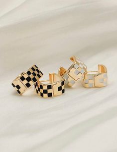 A fun way to add style and color to any outfit! Trendy Gold Enamel Hoop Earrings, Trendy White Huggie Earrings For Everyday, Everyday Trendy White Huggie Earrings, Trendy White Huggie Hoop Earrings, Trendy Small Hoop White Jewelry, Ear Accessories, Dainty Hoop Earrings, Black White And Gold, Gold Enamel