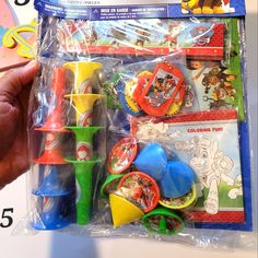 there is a plastic bag with toys in it