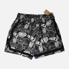 a black and white shorts with the word mike on it, printed in different colors