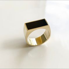 14k Black Onyx Ring, Ring for Men,Gold Ring, Black Ring, Solid Gold Ring, Modern Ring, Thick Ring, Flat Top Features * Made to Order. * Gold Kt: 14K  * Custom Gold Color: Rose Gold,White Gold, Yellow Gold * Size: Thickness if band is 10.5mm. Width at top is 22mm * Ready to Ship in 14 Business Days .  This jewelry is: ✪ Anti-Fading ✪ Nickel Free ✪ Non-Irritating metal ✪ Metal Allergy Free / Hypoallergenic ✪ Tarnish Resistant ✪ One Year Warranty How we wrap your jewelry We wrap your jewelry in a c Luxury Ring With Polished Finish And Rectangular Stone, Modern Black Enamel Signet Ring For Anniversary, Modern Onyx Open Ring, Black Signet Ring With Polished Finish For Promise, Black 14k Gold Open Signet Ring, Modern Onyx Signet Ring For Anniversary, Modern Yellow Gold Signet Ring With Black Enamel, Modern Black Enamel Ring For Anniversary, Black 14k Gold Signet Ring With Polished Finish