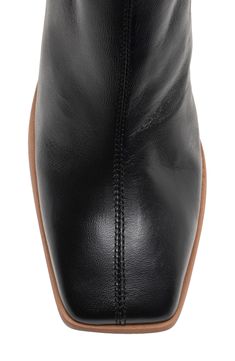 Crafted from soft Portuguese leather, this refined ankle boot with a squared-off toe and block heel pairs well with work or the weekend. 3 1/4" heel (size 8.5 US) 5" shaft Inset side-zip closure Leather upper and lining/rubber sole Made in Portugal Classic Slippers, Kids Rain Boots, Flip Flop Slippers, Clutch Pouch, Ugg Classic, Designer Crossbody Bags, Sweaters And Leggings, Womens Boots Ankle