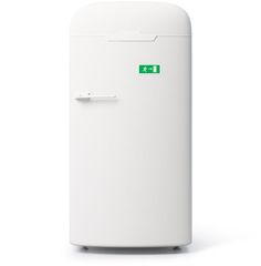 a white refrigerator with a green sticker on the front and bottom door is shown