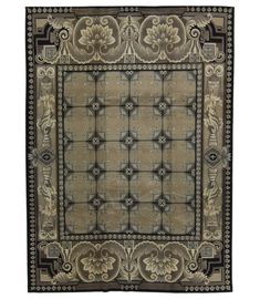 a rug with an intricate design on the front and back sides, in brown tones