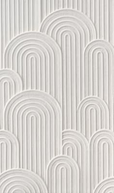 a white wallpaper with wavy lines on it