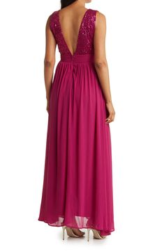 Sparkling sequins bring dazzling allure to a plunging v-neck maxi dress that is styled with a swishy skirt. 60" length (size S) V-neck Sleeveless Main: 95% polyester, 5% spandex; lining: 100% polyester Hand wash cold, lay flat to dry Imported Model stats: 5'10", 32" bust, 25" waist, 36" hip. Model is wearing size S. V-neck Sequin Dress With Contrast Sequin For Prom, Glamorous Backless Maxi Bridesmaid Dress, V-neck Sequin Maxi Dress For Party Season, Sequin V-neck Maxi Dress For Party Season, Glamorous V-neck Sequined Maxi Dress, Formal Maxi Dress With Contrast Sequin, Formal Contrast Sequin Maxi Dress, Sleeveless Sequin Bridesmaid Maxi Dress, V-neck Maxi Dress For Gala Party Season