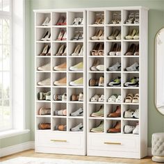 a large white closet filled with lots of shoes