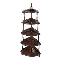 three tiered wooden shelf with carved designs on the top and bottom, in red wood