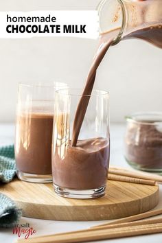 homemade chocolate milk being poured into glasses