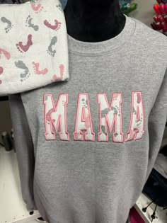 Mama Embroidered Baby Outfit Keepsake Applique Sweatshirt, Gift for Mom, Personalized Mama Shirt, Mama Keepsake Sweatshirt With Baby Clothes - Etsy Embroidery Machine Projects, Applique Sweatshirt, Diy Baby Clothes, Mom Sweater, Baby Themes, Mama Shirts, Mama Sweatshirt, Baby Outfit, Baby Crafts