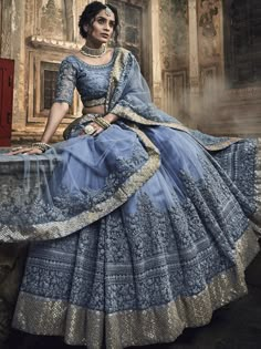 Pleasing grey embroidered wedding lehenga choli for upcoming grand events. This elegent lehenga cholis set comprise net with net blouse and net dupatta. Anarkali Saree With Intricate Embroidery For Ceremony, Anarkali Sharara With Cutdana For Ceremonies, Sharara With Pallu For Ceremony And Eid, Traditional Gown With Cutdana For Ceremony, Traditional Ceremony Sharara With Dupatta, Ceremonial Sharara With Pallu For Eid, Sharara For Eid Ceremony, Traditional Ceremony Gown With Cutdana, Eid Ceremony Sharara With Pallu