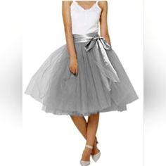 Size 20. Never Worn Fitted Midi Tulle Skirt, Fitted Tulle Pleated Midi Skirt, Chic Tulle Flared Skirt, Chic Flared Tulle Skirt, Spring Tulle Full Mini Skirt, Spring Mini Tulle Skirt Dress, Spring Full Tulle Mini Skirt, Fitted Long Tulle Pleated Skirt, Fitted Tulle Mini Skirt With Tiered Design