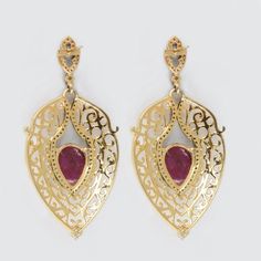 ⚫ This Earrings made with ruby & diamonds in 14k yellow gold, 925 sterling silver,⚫ Pave Diamond Gemstone Earrings 925 Sterling Silver Jewelry.⚫ Gemstone Earrings, Diamond Earrings , Silver Earrings , Everyday Jewelry⚫ Special customize for Mother's day, Anniversary, Birthday Gift, Valentine, Christmas. ⚫ Item Details:Gross Weight:12.64 Grams14k Yellow Gold Weight:0.322 Grams925 Sterling Silver Weight:10.42 GramsDiamond Weight:0.89 CaratsGemstone Weight:8.6 CaratsItem Size: 57 x 27 mmItem SK Luxury Earrings With Intricate Design, Gold Plated Filigree Danglers For Wedding, Wedding Gold Plated Danglers With Filigree, Elegant Rose Gold Filigree Earrings, Yellow Gold Drop Earrings For Bridal Celebration, Yellow Gold Hallmarked Danglers For Wedding, Teardrop Jewelry With Intricate Design For Party, Luxury Yellow Gold Teardrop Chandelier Earrings, Luxury Pierced Earrings For Party