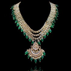 Perfect choice for the wedding events, our Sabira Mala is impeccably designed with enticing details! Exuding brilliance, this mala is encrusted with glittering kundan stones and emerald bead drops. Approximate mala length is 10". Gold-plated on high-quality brass as base metal. Made by order. Kindly allow 4-6 weeks for the delivery of this item. For custom or urgent requests, please contact support@alacouture.com. *Please Note: We use faux stones and beads in all of our jewelry. Heavy Jewellery, Emerald Bead, Faux Stone, Base Metal, Wedding Events, Diamond Necklace, Statement Necklace, Emerald, Gold Plate