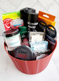 a red basket filled with lots of different types of hair products and grooming items