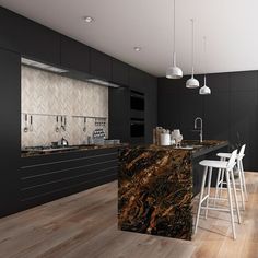 a modern kitchen with marble counter tops and black cabinets, along with white bar stools