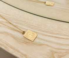 Experience the luxury of our 18k gold-plated stainless steel Initial Necklace! Free of lead and nickel, with a 16-inch chain and a 4-inch extender, you'll be stylishly adorned for any occasion. Gold Metal Initial Pendant Necklace, Initial Pendant Necklace Gift For Her, Gold Metal Pendant Initial Necklace, Tarnish Resistant Initial Pendant Necklace For Her, Tarnish Resistant Initial Pendant Necklace As Gift For Her, Gold-tone Initial Pendant Necklace, Gold Chain Necklace With Initial Pendant, Gold-tone Tarnish Resistant Initial Pendant Necklace, Metal Initial Pendant Necklaces Tarnish Resistant