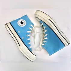 Converse All Star, Light Blue Canvas Material, Creme/ Off White Rubber Sole And Laces. Brand New, Never Worn, Glossed Toe And Sole, Dark Brown Rubber Bottom, Off White Cotton Laces, Unisex, Easy To Clean, Comfortable, And Trendy Blue Converse High-top Sneakers For Sports, Trendy Blue Mid-top Sneakers, Blue Converse High-top Sneakers With Rubber Sole, Blue Converse Sporty High-top Sneakers, Retro Blue Mid-top High-top Sneakers, Sporty Blue Converse High-top Sneakers, Blue High-top Canvas Shoes With Rubber Sole, Blue Mid-top Canvas Shoes With Rubber Sole, Blue Round Toe Canvas Shoes For Streetwear