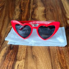 Never Worn, Super Cute Heart Sunglasses In Red. Will Sell Individually Or Willing To Make A Deal On All 3 As A Bundle (Save On Shipping Too!). Fun Red Heart-shaped Sunglasses, Cute Red Party Sunglasses, Trendy Red Sunglasses As Gift, Fun Red Sunglasses For Valentine's Day, Red Tinted Sunglasses As A Gift, Cute Red Sunglasses For Summer, Red Tinted Lenses Sunglasses As Gift, Red Heart-shaped Sunglasses For Valentine's Day, Valentine's Day Casual Party Sunglasses