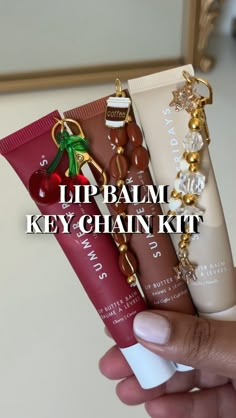 Lip Balm Key Chain Kit! You will receive: -key clasp and ring -2 ring links - 2ft of elastic thread -20-25 smaller beads  -Main Charm depending on which set you choose! (Cherry, strawberry cake, diamond stars, coffee cup) *LIP BALM NOT INCLUDED* *hole puncher also not included! Please use a thumbtack or safety pin to make the hole in the lip balm* Things To Give Your Bf For His Birthday, Lip Balm Sets, Things To Make Your Friends For Christmas, How To Get Smaller Lips, Charms On Lip Gloss, Mom Homemade Gifts, Gen Z Crafts, Stuff To Get Your Mom For Christmas, Laneige Lip Balm Keychain