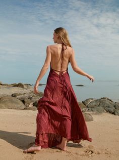 Embrace dreamy vacation vibes any time of the year with this tie-dye halter neck maxi dress in burgundy. Designed for long, carefree days under the sun, the Luna Maxi Dress strikes the balance between stylish and comfortable. Featuring a jaw-dropping deep V-neck and a head-turning open back, this maxi dress gives you a slender, elongated silhouette that you’ll love. The almost fluidic softness of the fabric and the delicate flow of the full-length hemline give you an effortlessly graceful look.W Long Summer Dresses Floral, Dreamy Vacation, Dress For Vacation, Summer Maxi Dresses, Halter Neck Maxi Dress, Long Kaftan, Handkerchief Dress, Hand Tie, Goddess Dress