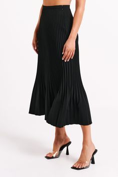 Pleats please.This is a full-length maxi skirt with an invisible side zipper and waist-to-hem pleats. Fresh and versatile, its polyester-and-elastane fabrication allows it to look loose and flowy without losing its structure. Small details like the fitted waist and pleated hem for visual appeal but at a timeless length. We recommend sizing down in this style. Stretch Pleated Midi Skirt, Pleated Midi Maxi Skirt For Party, Flowy Party Maxi Skirt With Pleated Hem, Summer Evening Bottoms With Pleated Hem, Pleated Flared Maxi Skirt For Evening, Evening Pleated Flared Maxi Skirt, Stretch Pleated Midi Bottoms, Elegant Long Pleated Skirt With Elastic Waistband, Chic Pleated Voluminous Maxi Skirt