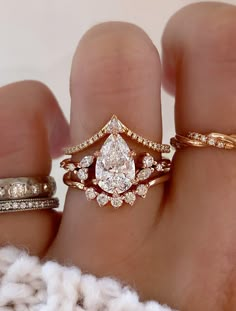 caption:Shown with 1.5ct pear diamond Stackable Pear Wedding Rings, Kay Jewelers Wedding Ring Sets, Crown Wedding Band With Pear Engagement Ring, Wedding Band For Odd Shaped Engagement Ring, Ballerina Wedding Ring, Pink Rose Gold Engagement Ring, Unique Wedding Bands For Pear Shaped Rings, Moissanite Antique Engagement Ring, Vintage Gold Wedding Ring Set