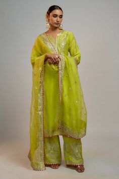 Gopi Vaid | Yellow One Shoulder Top And Pants | INDIASPOPUP.COM Kasab Embroidery, Gopi Vaid, Paisley Jacket, Bridal Lehenga Red, Pakistani Fashion Casual, Leaf Motif, Straight Kurta, Sharara Set, Dress Indian Style