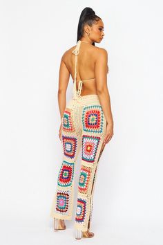 The Mali Crochet Pants Set is perfect for summer. It is crafted from high quality materials and features bright vibrant multi color crochet detailing. Perfect for vacations and summer concerts. 100% Acrylic Fitted Beach Bottoms With Crochet Trim, Bohemian Crochet Bottoms For The Beach, Bohemian Crochet Bottoms For Beach, Summer Crochet Bottoms For Beach, Bohemian Crochet Beach Bottoms, Crochet Bottoms For Beach Vacation, Hippie Stretch Bottoms For Beach, Hippie Multicolor Bottoms For Beach Season, Fitted Hippie Bottoms For Vacation