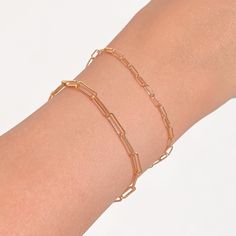 A delicate gold paperclip bracelet. Wear on its own or layer with our Figaro bracelet. This paperclip bracelet makes for the perfect layering piece. BUY 2, GET 1 FREE. Coupon applied at checkout. - Width: 2.5 mm. - Adjustable chain 6 to 8 in.- Shower safe / Tarnish resistant / Hypoallergenic- Made in gold vermeil: a thick 18k gold layer on sterling silver- 1 Year warranty Elegant Gold Plated Paperclip Chain Bracelet, Gold Paperclip Bracelet For Everyday, Gold Paperclip Everyday Bracelet, Modern Gold Plated Paperclip Chain Bracelet, Delicate Gold Paperclip Bracelet For Everyday Wear, Everyday Gold Plated Paperclip Bracelet With Oval Link, Gold Plated Minimalist Paperclip Bracelet, Dainty 14k Gold-filled Paperclip Bracelet For Everyday, Dainty 14k Gold Filled Paperclip Bracelet For Everyday