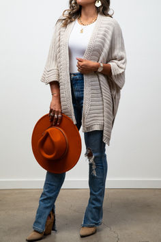 Introducing the Emma Ridged Rib Knit Ruana! Wrap yourself in cozy, ribbed knit goodness with this versatile ruana. Perfect for adding a touch of warmth and style to any outfit.

One Size Fits Most
Size : 55" x 36"
Length : 27 1/2"
Bust Across : 36"
Sleeve Slit 11" Ruana Wrap, Graphic Tops, Dress Accessories, Denim Pants, Set Dress, Rib Knit, Sweater Cardigan