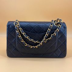 Chanel 24K Gold Classic Flap medium size X89453 Product Details Size: W25 x H16 x D6.5 CM Color：black Accessory: dust bag, card Condition: very good Sub-category: Shoulder bag&Crossbody bag Please Note: All products in our store are second-hand and vintage. ITEM LOCATION IS CANADA. Duties are set by the destination country/province's customs authorities. We are not responsible for paying any duties. These are the actual photos of the item. This item was cared for by a previous owner. Due to its Elegant Double Flap Bag With Dust Bag Included, Timeless Evening Bag With Double Flap, High-end Bags With Cc Turnlock Closure And Double Flap, Timeless Double Flap Evening Bags, Classic Gold Bag With Cc Turnlock Closure, Elegant Gold Bag With Double Flap, Elegant Gold Double Flap Bag, Classic Evening Bag With Flap, Classic Bags With Cc Turnlock Closure For Shopping