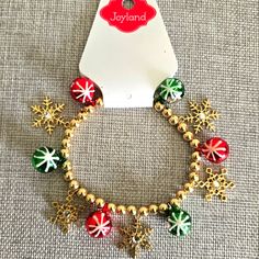 New With Tags Elastic Christmas Bracelet Color: Gold, Red, Green, And White Size: Stretch Product Comes From A Smoke And Pet Free Environment. Tags: Festival Red Green Stretch Crystal Christmas Charm Bracelet, Christmas Bead, Christmas Bracelet, Christmas Charms, Jingle Bell, Christmas Jewelry, Jingle Bells, Stretch Bracelet, Green And White