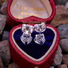 We just love this pair of heart diamond stud earrings. Each mounting features one (1) heart brilliant cut diamond set into a three-prong setting. The earrings are finished with friction backs and posts for pierced ears. Classic Diamond Heart Earrings, Valentine's Day Round Cut Diamond Earrings, Diamond White Round Cut Earrings For Valentine's Day, Diamond Heart Cut Earrings With Prong Setting, Fine Jewelry Heart Cut Brilliant Earrings, Valentine's Day Round Cut Prong Set Earrings, Diamond Heart Earrings With Prong Setting, Diamond Cut Earrings For Valentine's Day, Diamond Heart Earrings With Prong Setting For Formal Events