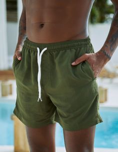 Rsq Nylon Shorts. Elastic Drawstring Waist. Welt Hand Pockets. Back Right Patch Pocket. Approximate Inseam: 6". Approximate Outseam: 17". 100% Recycled Nylon. Machine Wash. Imported. | Rsq 6" Nylon Shorts Casual Sports Shorts For Beach Season, Nylon Bottoms With Built-in Shorts For Beach Season, Green Swim Trunks With Elastic Waistband For Summer, Green Summer Swim Trunks With Elastic Waistband, Casual Green Swim Trunks With Built-in Shorts, Solid Summer Sports Bottoms, Solid Color Summer Sports Bottoms, Casual Moisture-wicking Shorts For Beach Season, Green Drawstring Summer Shorts