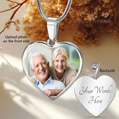 a heart shaped pendant with an image of two people on it and the words your words here