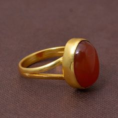 Handmade PRODUCT CODE :- HA1 Material :- Brass Size :- Any Carnelian Brass Ring,Handmade Ring,Unique Ring,orange Stone Ring,Boho Ring,Anniversary Ring,Wedding Ring,Vintage Ring,Gift Ring, Deco Ring, This Red carnelian gold ring have a statement Anyone will notice your classic style with that amazing unique ring, Carnelian stone is known for encouraging motivation, prosparity and good luck.:) ♥We Crafted These in 100% Solid Brass These Simple rings are perfect for any occasion. Make a Statement w Oval Agate Crystal Ring With Gemstone, Oval Agate Gemstone Crystal Ring, Oval Agate Hallmarked Rings, Classic Agate Round Rings, Classic Round Agate Ring, Classic Agate Ring, Carnelian Oval Jewelry For Anniversary, Oval Carnelian Jewelry For Anniversary, Classic Agate Rings For Anniversary