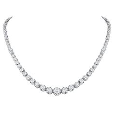 This finely made graduated necklace with beautiful round diamonds sits elegantly on any neck. Metal: 14k Gold Diamond Cut: Round Total Diamond Approx. Carats: 10ct Diamond Clarity: VS Diamond Color: F-G Size: 18 inches Color: White Gold Included with your order: Certificate of Appraisal Customized Necklace Box & Bag Customized Necklace, Vvs Diamond, Diamond Tennis Necklace, Graduation Necklace, Vs Diamond, Station Necklace, Tennis Necklace, Necklace Box, American Diamond