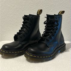 Dr Martens Women 8 Eyelet Boots Color Black 8 Eyelet Nwot Excellent Condition Never Worn Black Fitted Martin Boots With Round Toe, Fitted Black Martin Boots With Round Toe, Black Fitted Lace-up Boots With Round Toe, Fitted Black Ankle Martin Boots, Black Fitted Lace-up Boots For Casual Wear, Classic Black Ankle-high Moto Boots, Classic Black High-top Moto Boots, Classic Black Martin Boots For Winter, Classic Lace-up Boots Medium Width