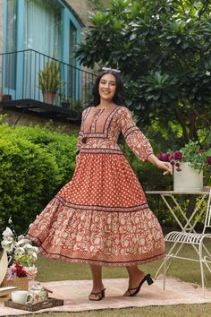 This unique handblock print is the highlight of this dress, along with the beautiful mix and match of vibrant prints ! Using the best quality cotton fabric along with the lovely combination of red and beige, this dress makes for a perfect wear at any outing, casual or dressy .Pair it with lacy sandals or comfy flats, the MIDI length is perfect to move around with ease. Block print cotton dress also features 3/4th sleeves. Model is wearing size S Size chart in PICS.Size chart attached in images m Red Christmas Dress, Tier Dress, Floral Cotton Dress, Printed Cotton Dress, Christmas Dress, Indian Design, Holiday Dresses, New Arrival Dress, Cotton Dresses