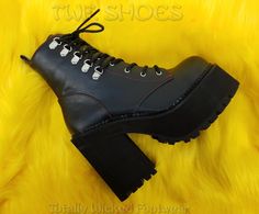 Watch Video 4 3/4"(12cm) Block Heel, 2 1/4"(5.75cm) Cleated Platform Double D-Ring Lace-Up Front Ankle Boot w/Red Stitch Detail Full Length Inside Zip Closure WOMEN'S Size's 6-11 ******Please note****** Due to High Volume Sales Pleaser/ Demonia has stopped all Direct Shipping Orders may take up to 6 weeks to arrive as we have to order them in to ship to you Shop Our collection of Pleaser In House for FAST Shipping!! contact us with any questions or concerns before ordering or if your size is not Y2k Shoes, Everyday Dress, Cool Shoes, Shoes Socks, Gothic Punk, Shipping Orders, Everyday Dresses, Discount Codes, Descendants