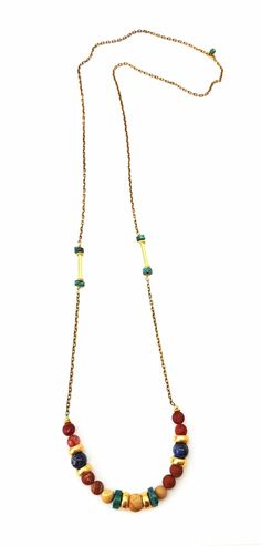 Beautiful throw on necklace.  Made of gold plated accents with jade, jasper, turquoise and gold plated chain. 30 inches with no clasp. Gold Turquoise Necklace With Beaded Chain As Gift, Turquoise And Gold, Gold Plated Chains, Tassel Necklace, Jade, Beaded Necklace, Gold Plate, Plating, Turquoise