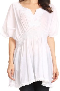 One Size Regular: (Fits Approximate Top Size: US 0-16, EU 34-48, UK 6-20) Max bust size: 70 inches (178cm) Max waist size: 44 inches (112cm) Approximate Length = 29.5 inches (75cm) Measured shoulder to hem. Featuring gorgeous embroidery, a fringe hemline, dolman sleeve, and smocked waist, this top will become a staple of your summer wardrobe. The versatility allows you to wear it as an everyday blouse or a cover up! Enjoy the relaxed and flattering fit as well as the breathable 100% cotton fabri Boardwalk Outfit, Cute Coverups, Fringe Blouse, Elegant Embroidery, Fashion Inspiration Design, Cotton Blouses, Dolman Sleeve, Summer Wardrobe, Summer Looks