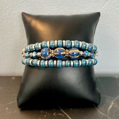 Triple wrap leather bracelette with glass beads. Fits all sizes. Adjustable Beaded Wrap Bracelet Bangle, Adjustable Blue Wrap Bracelet With Faceted Beads, Elegant Adjustable Wrap Bracelet With Colorful Beads, Adjustable Czech Glass Beads Bracelet, Adjustable Multi-strand Bracelets With Faceted Beads, Adjustable Multi-strand Colorful Beads Wrap Bracelet, Adjustable Blue Multi-strand Wrap Bracelet, Adjustable Multi-strand Blue Wrap Bracelet, Adjustable Spiritual Wrap Bracelet With Spacer Beads