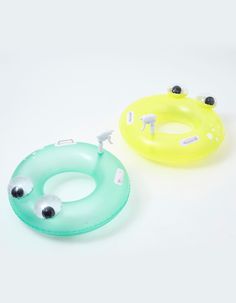 two inflatable floats sitting next to each other