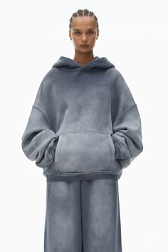 This oversized unisex hoodie in washed chalk showcases clear bead hotfix, accented by a logo at the chest.   attached hood kangaroo pocket hits at hip body composition: 75% cotton/25% polyester trim: 99% cotton/1% elastane female model is 5'9" and wears a size s male model is 6'1" and wears a size m made in china UCC1251749147B Hoodie Pocket Design Ideas, Mens Oversized Hoodie, Hoodie Sketch, Bedazzled Hoodie, Cut Out Hoodie, Crystal Hoodie, Washed Hoodie, Rhinestone Hoodie, Hoodie Mockup